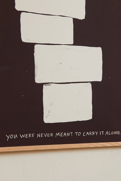 Art print featuring an abstract, minimalist painting in brown and white, and a handwritten note. Styled in a minimalist interior.