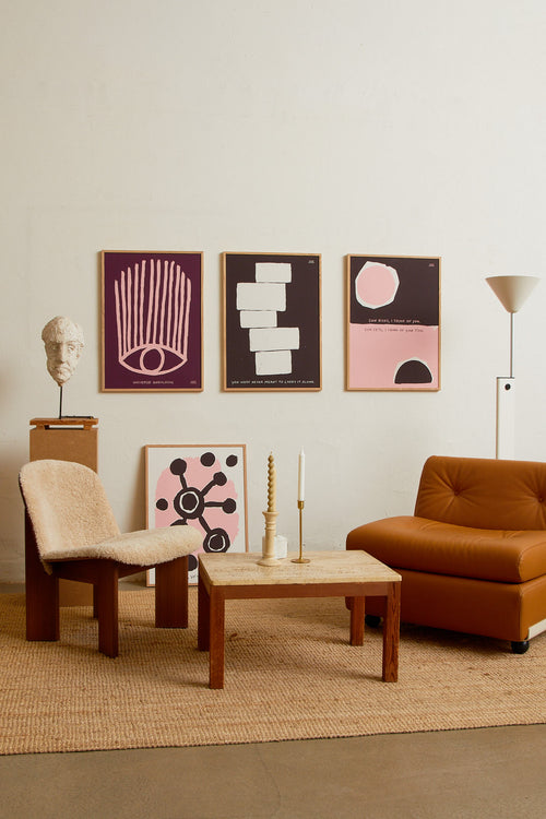 Art print featuring an abstract, minimalist painting in brown and white, and a handwritten note. Styled in a minimalist interior.