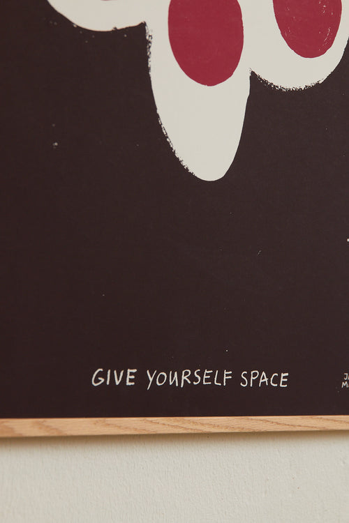 Close-up detail of the lower corner of the print with visible text