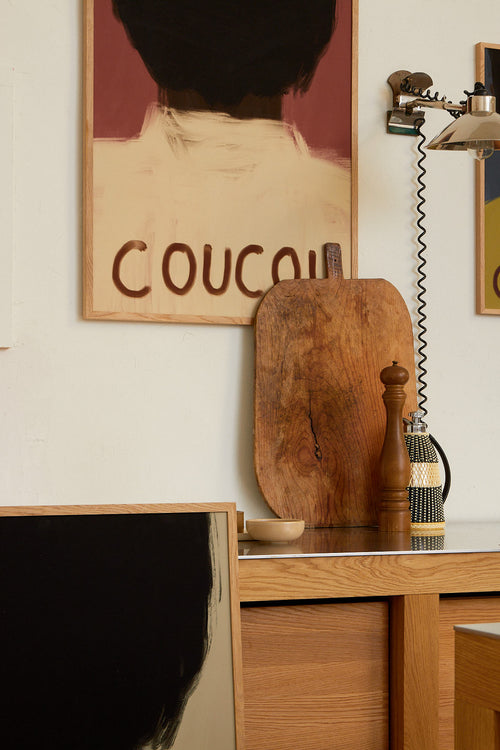 Wooden cutting board on a table with a 