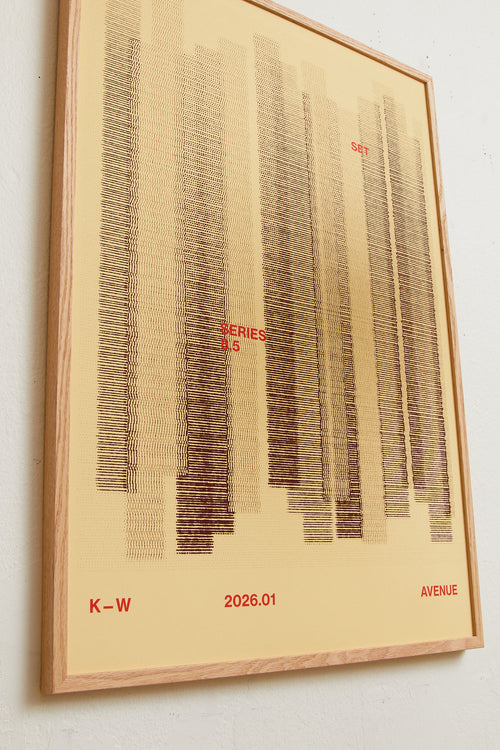 Art print with a graphic illustration of vertical fields built from dense lines, complemented by small text elements, in brown and beige RAL colors. Styled in a minimalist interior.