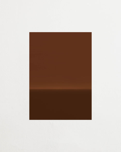 Art print with an abstract spray painting of a dark sky in deep brown tones. Featured against a light background.