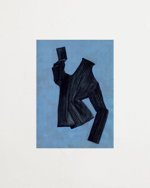 Black textured garment on a blue background