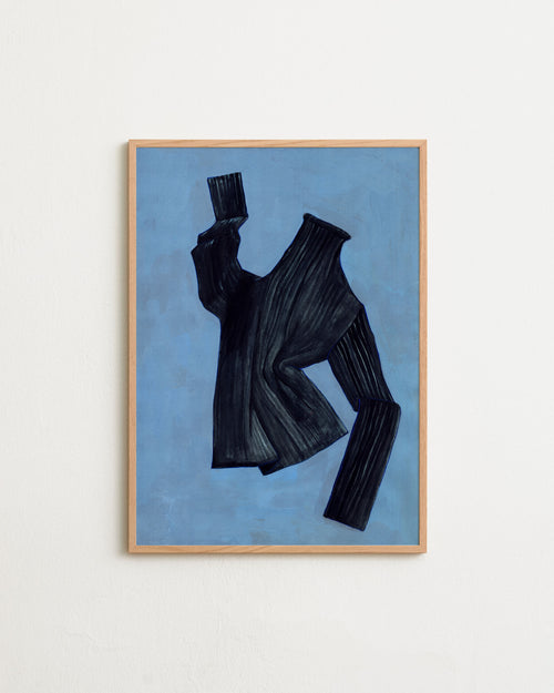Framed artwork of a black abstract figure on a blue background