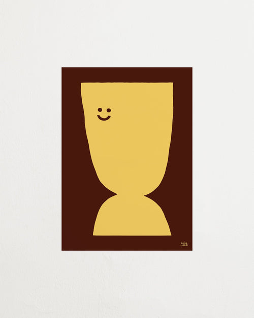 Yellow abstract figure with a smiley face in a brown frame on a white background
