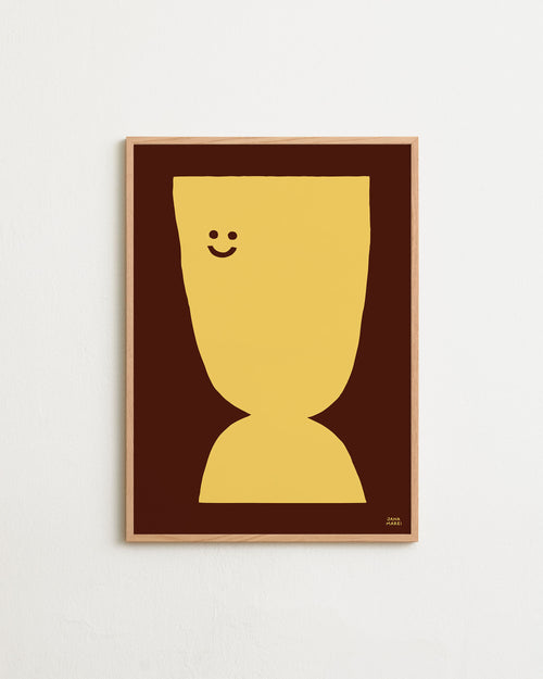 Framed artwork with a yellow abstract design on a brown background