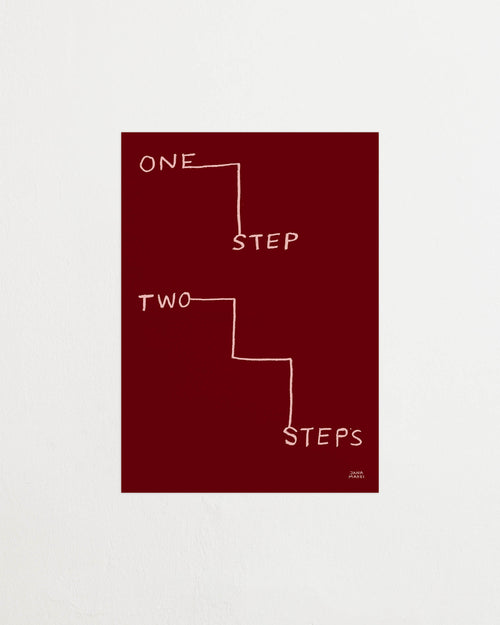 Close-up of red print with white line drawing and text details