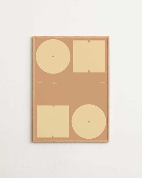 Framed artwork with geometric shapes on a beige background