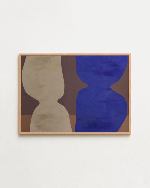 Abstract art piece with geometric shapes on a white wall