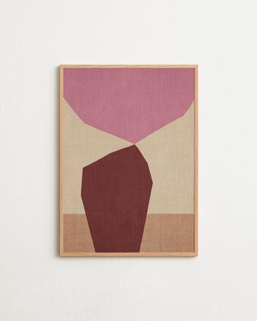 Framed abstract art with pink and brown shapes on a beige background