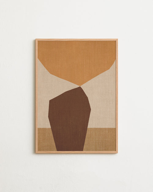 Framed abstract art with brown and beige shapes on a light background