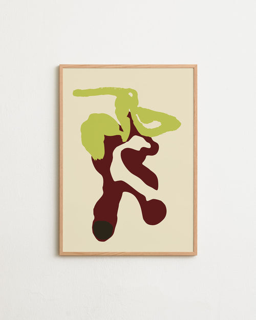 Framed abstract artwork with green and brown shapes on a beige background