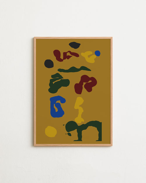 Framed abstract artwork with colorful shapes on a beige background