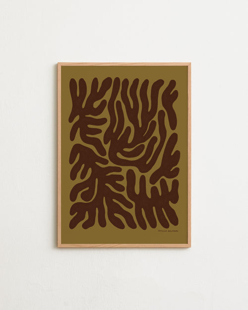 Framed abstract art print with brown patterns on a beige background
