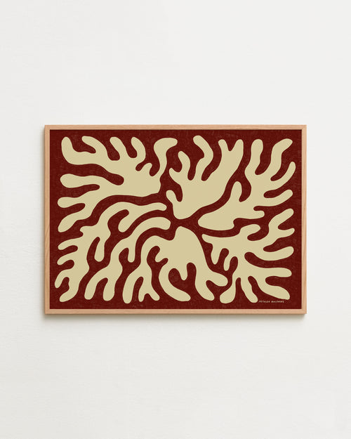 Decorative wall art with abstract design on a red background